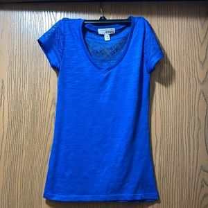Blue shirt with see thru back. Size medium